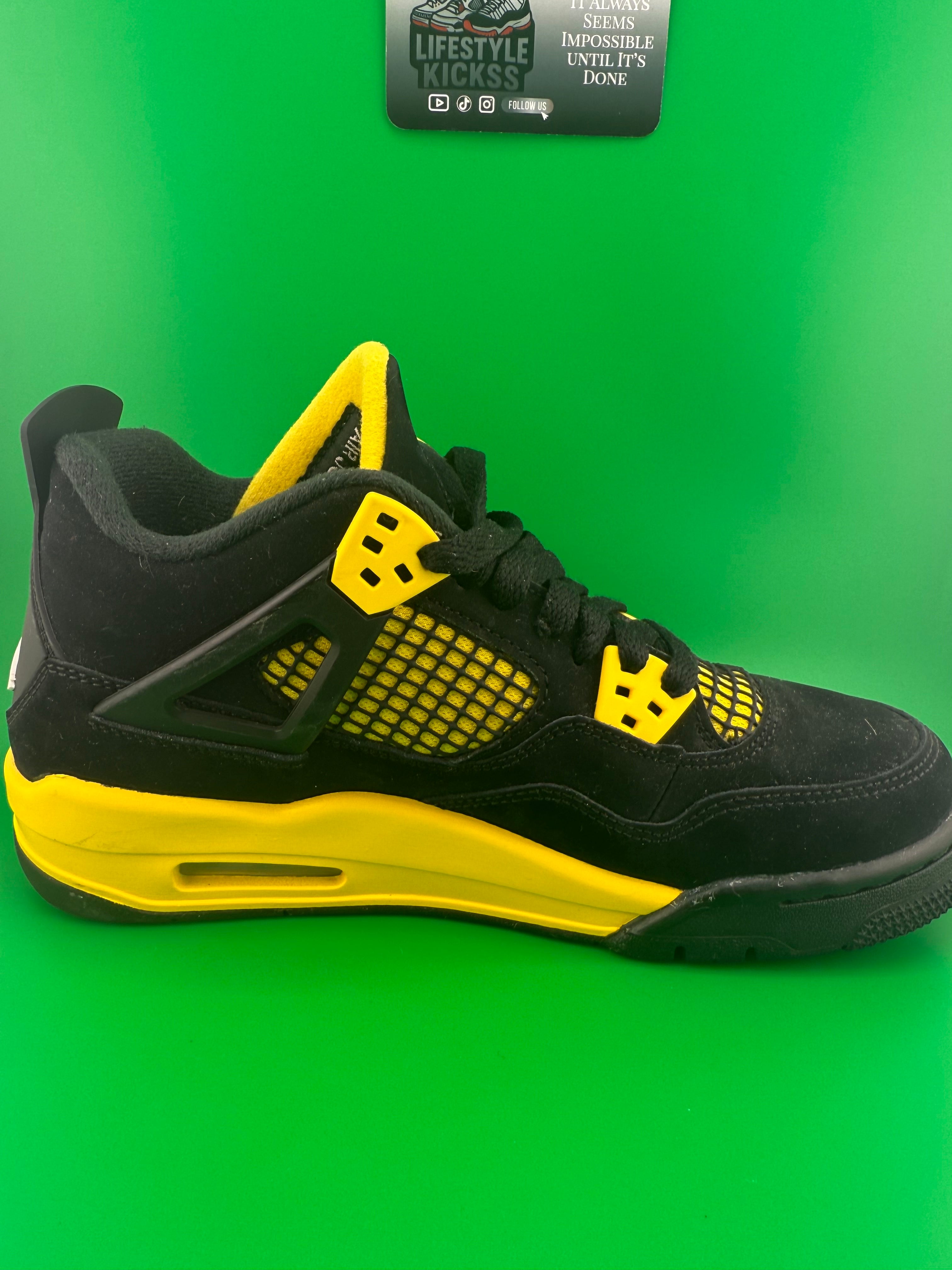 Jordan 4 Yellow Thunder Pre owned Size 6y